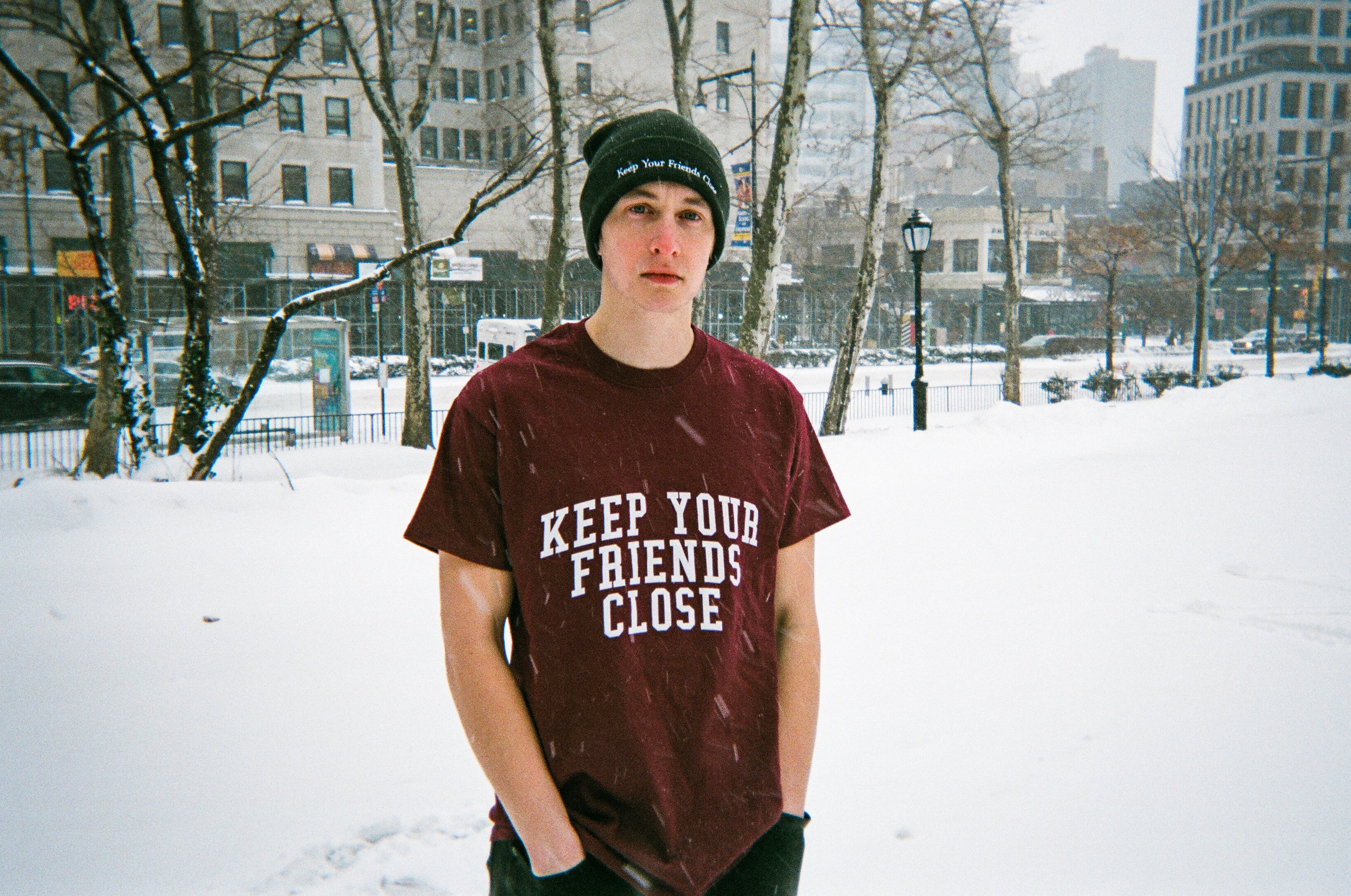 "Keep Your Friends Close" Vintage Collegiate Style T-Shirt (Red, Green, or Blue)
