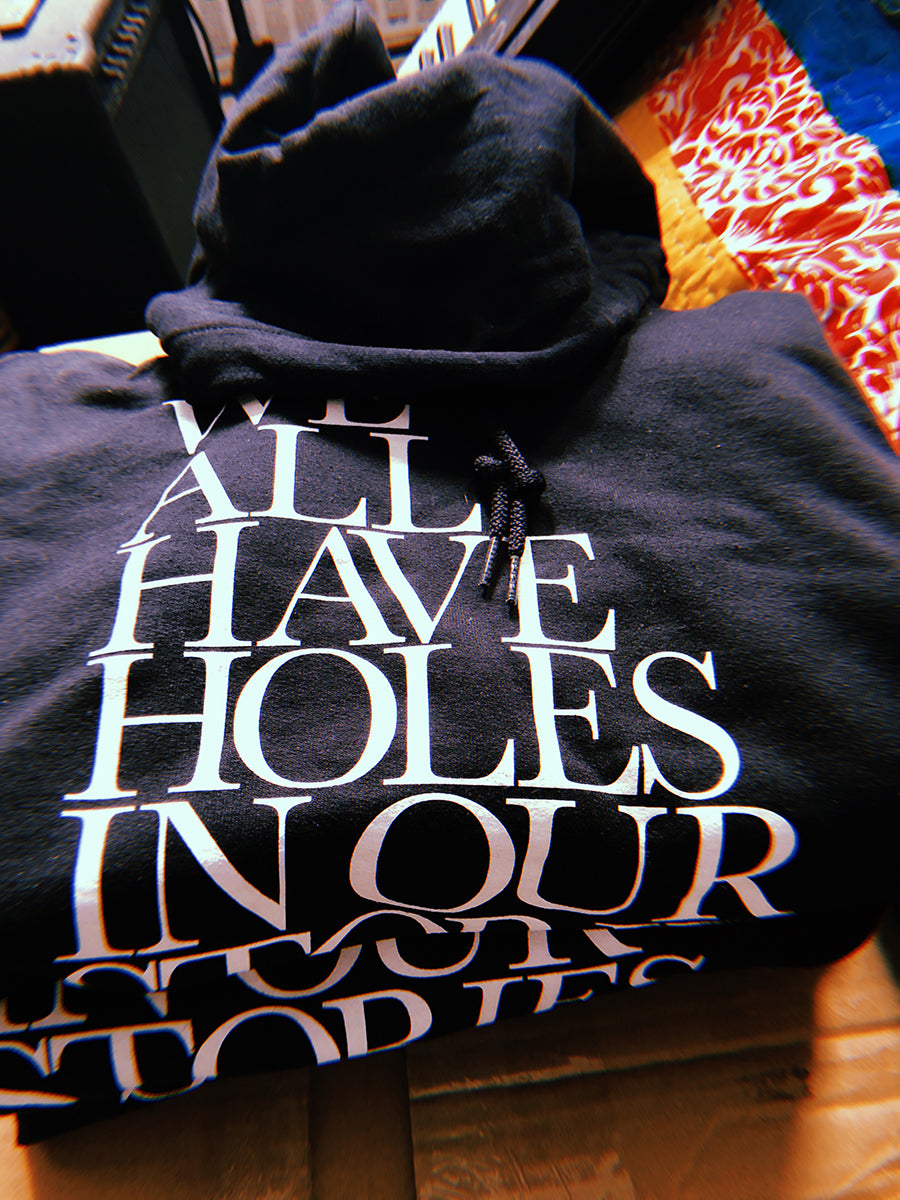 Holes In Our Stories Hoodies
